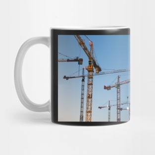 Cranes against clear blue sky Mug